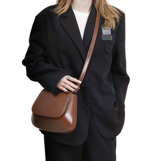 Brown PU leather saddle shoulder bag by B & P Atelier