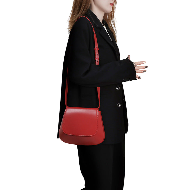 Red PU leather saddle shoulder bag by B & P Atelier