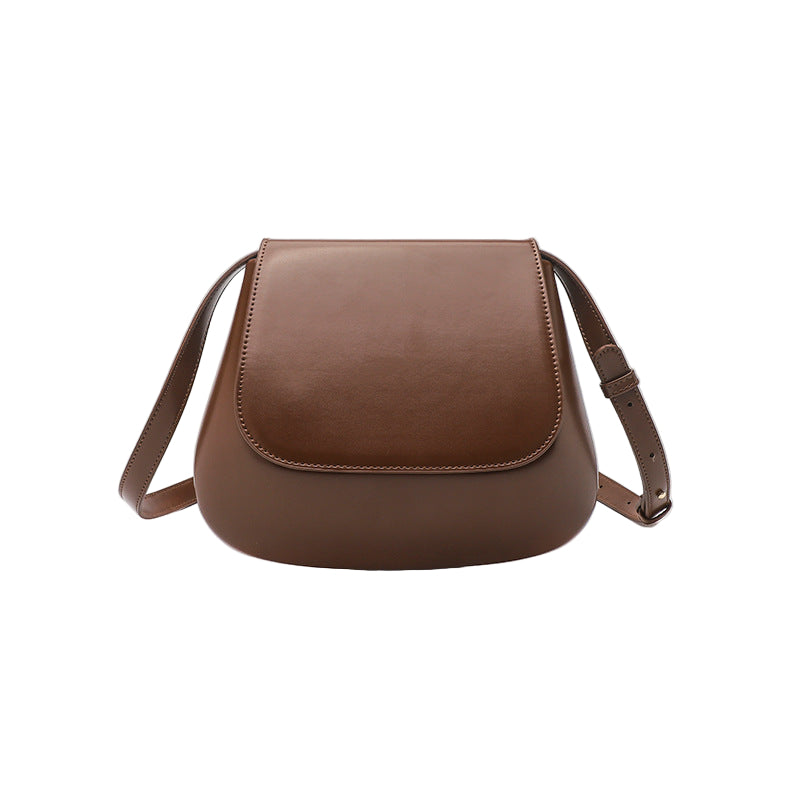 Brown PU leather saddle shoulder bag by B & P Atelier