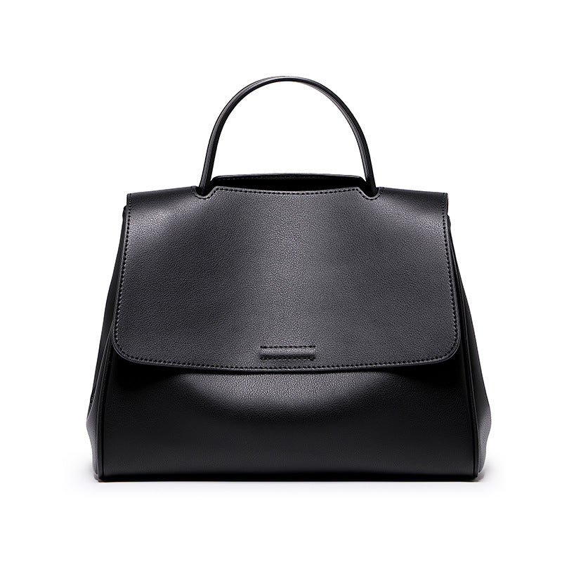 Soft-leather-look bucket bag in black with adjustable strap by B & P Atelier