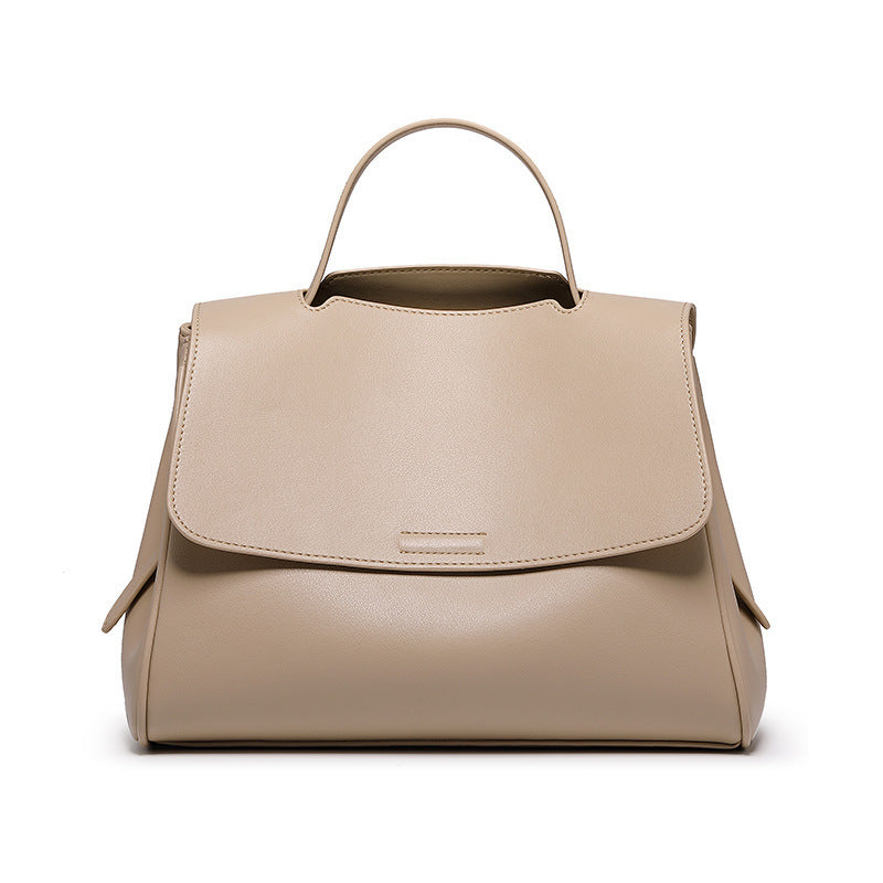 Soft-leather-look bucket bag in milk tea with adjustable strap by B & P Atelier