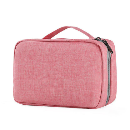 Waterproof PU toiletry travel bag in Salmon by B & P Atelier