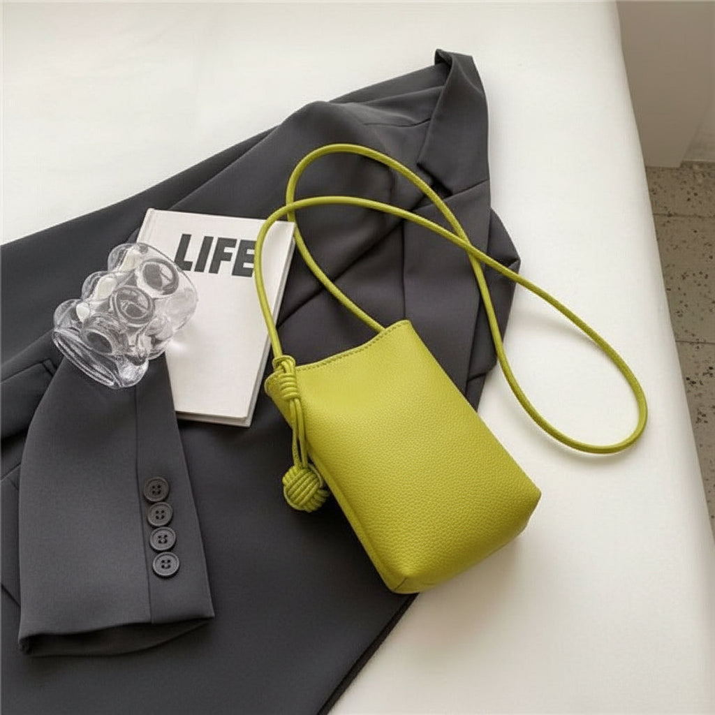 Mini phone crossbody bag in green PU leather